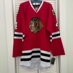 Authentic Reebok (RBK) jersey from the NHL Center Ice collection, Size 48, US-M